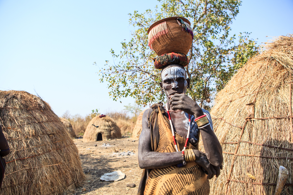 Mursi Tribe man in body paint