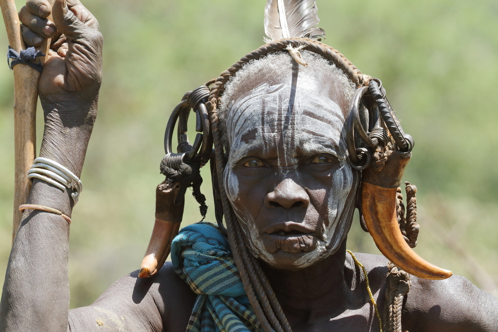 Mursi women in traditional paint