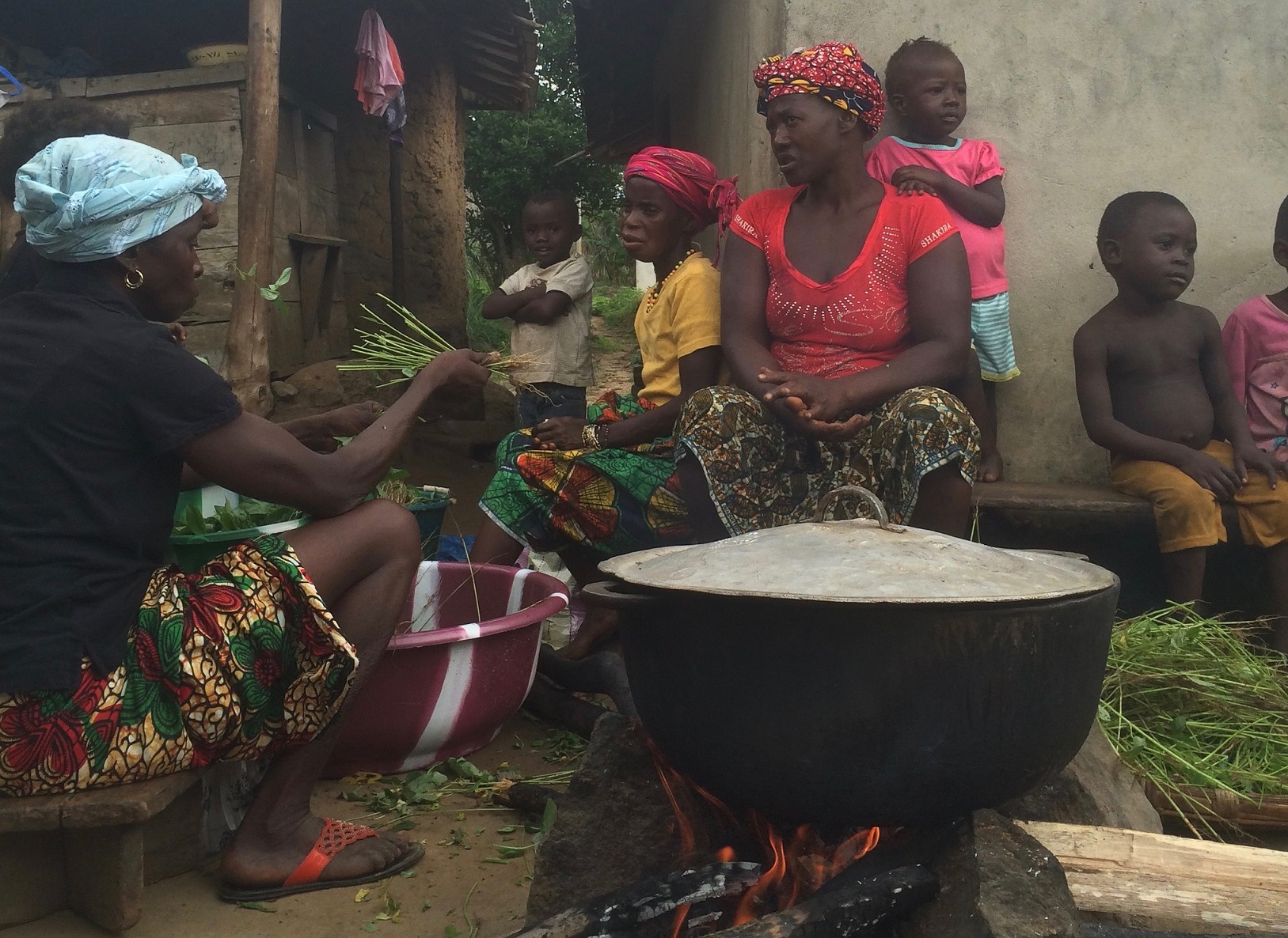 Cooking on an open fire, Tonkololi District, Sierra Leone. - 2016