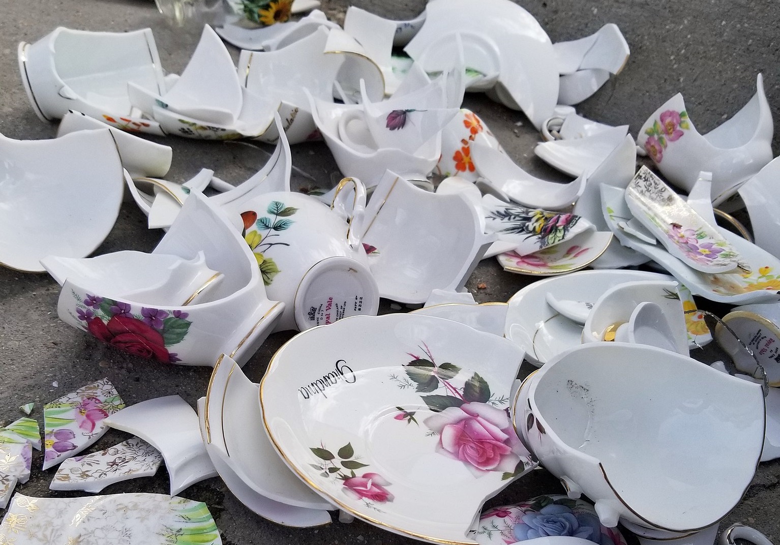 Bunch of broken China on the sidewalk in Winnipeg - 2018