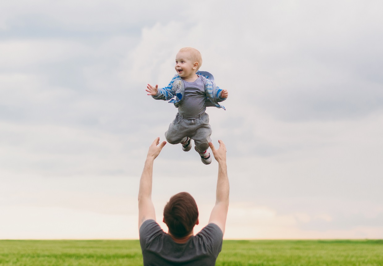 Father throw up little kid son.