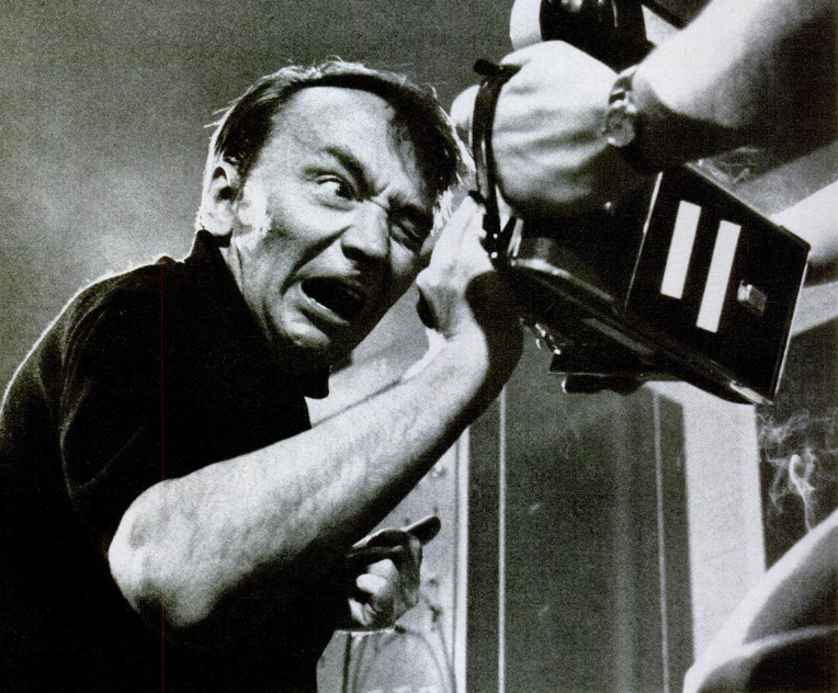 Grayscale Photo of Ted Serios, a Chicago bellhop