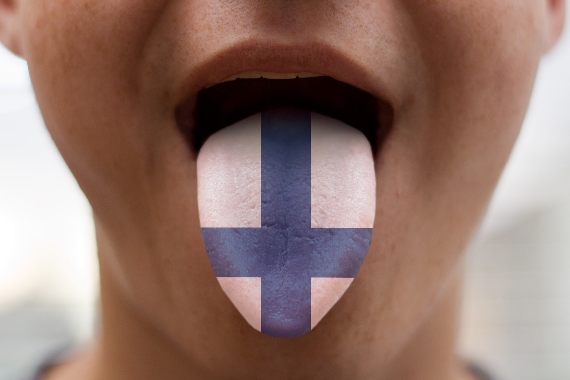 Tongue with the flag of Finland.
