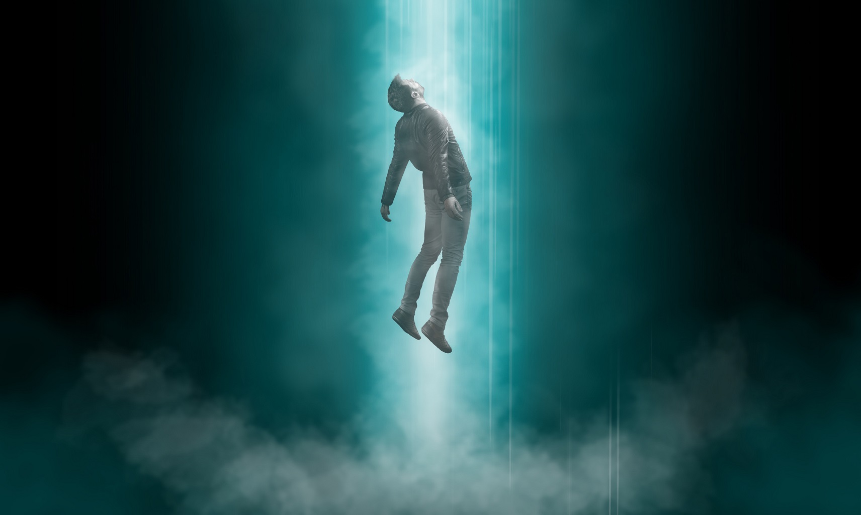 Man being abducted by UFO - alien abduction concept