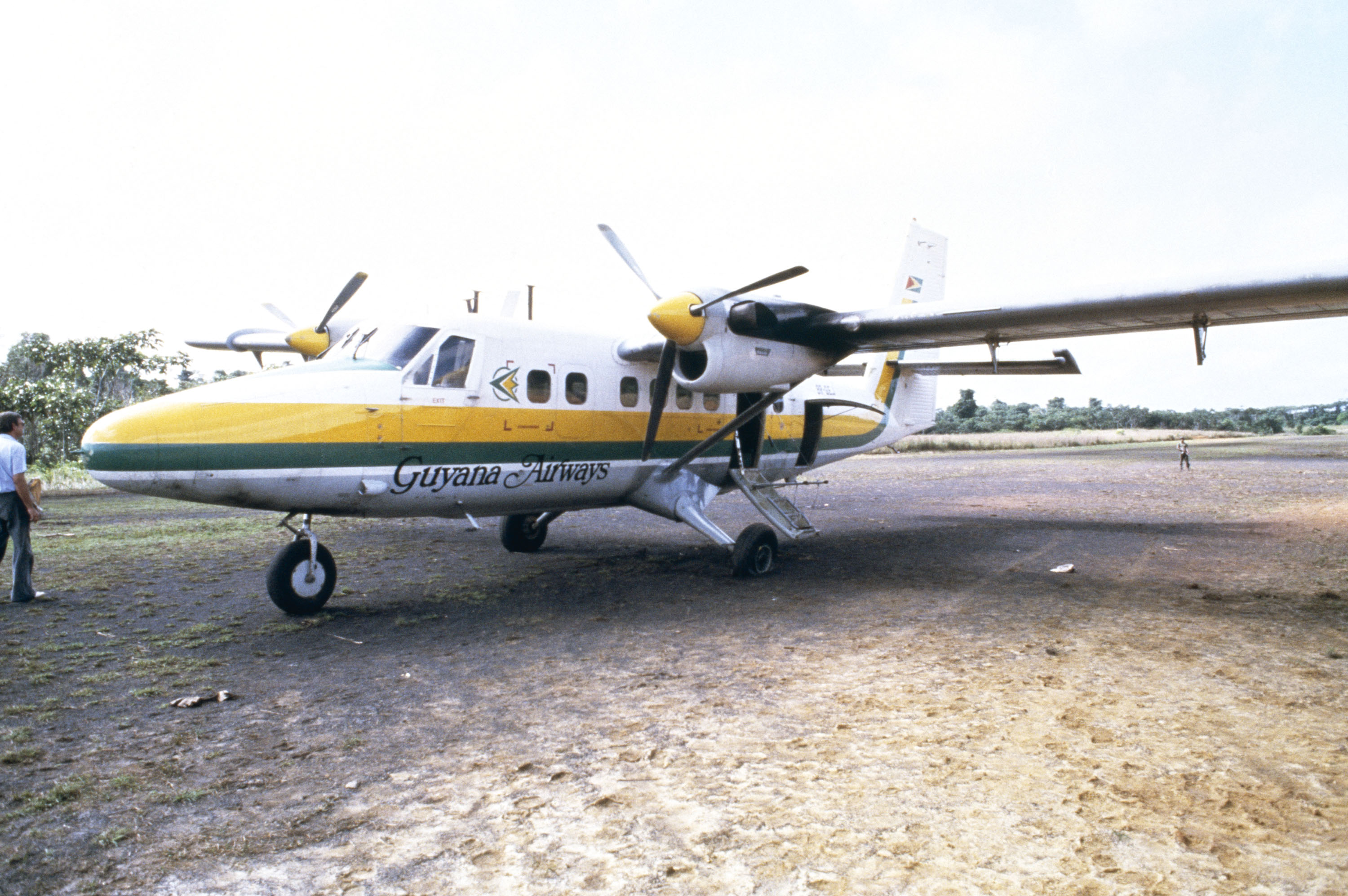 The airplane which carried California Congressman Leo Ryan sits on a runway November 18, 1978 in Port Kaituma, Guyana after he was shot and killed by members of Jim Jones' People's Temple cult