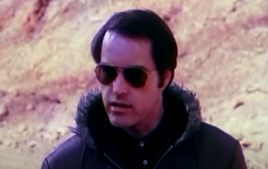 Powers Boothe as Rev. Jim Jones
