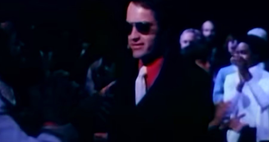 Powers Boothe as Rev. Jim Jones