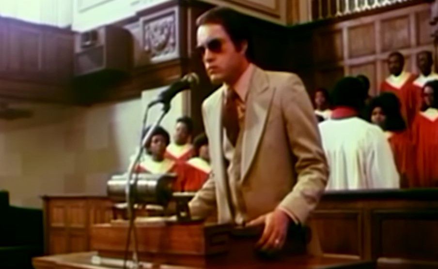 Powers Boothe as Rev. Jim Jones
