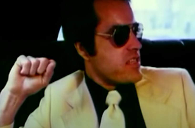 Powers Boothe as Rev. Jim Jones