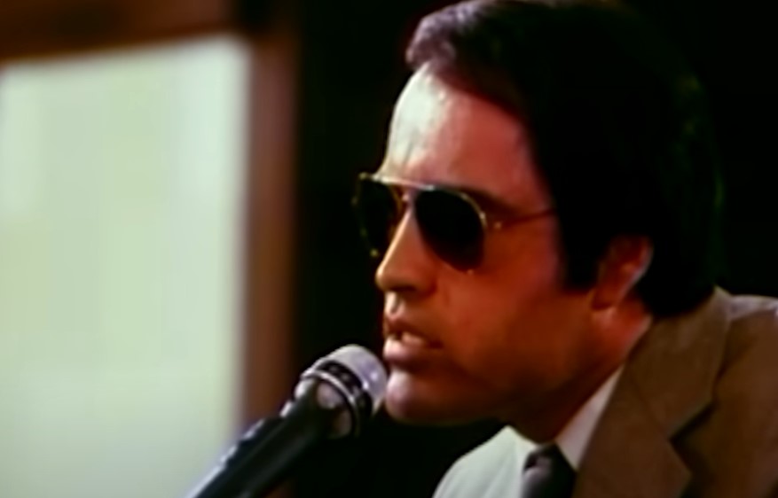 Boothe as Rev. Jim Jones