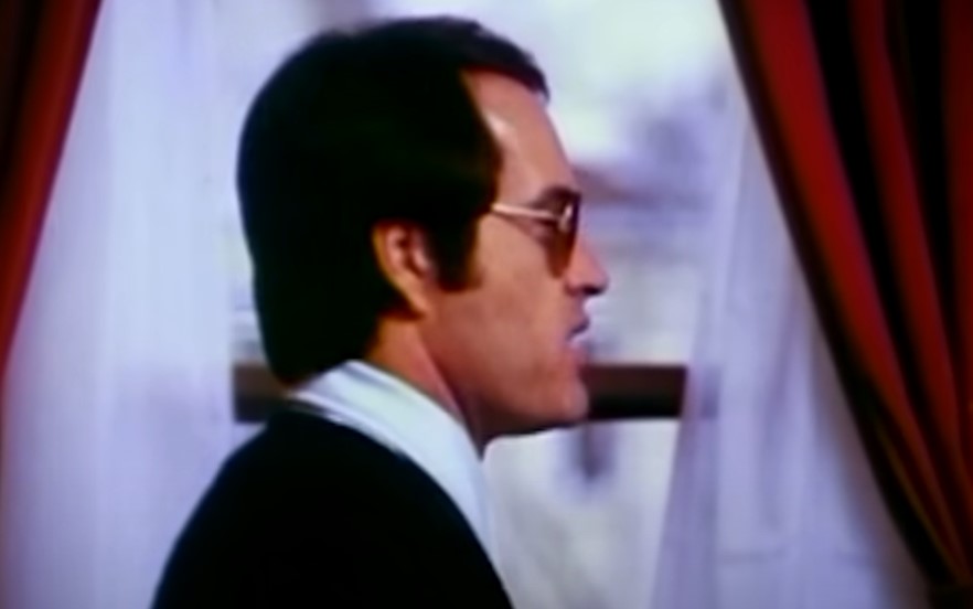 Powers  Boothe as Rev. Jim Jones