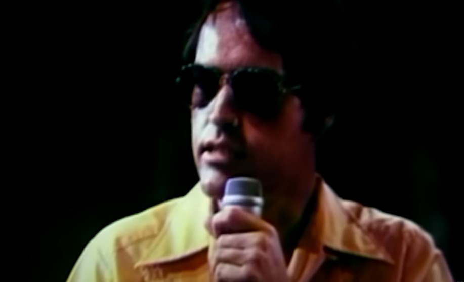 Powers Boothe as Rev. Jim Jones 
