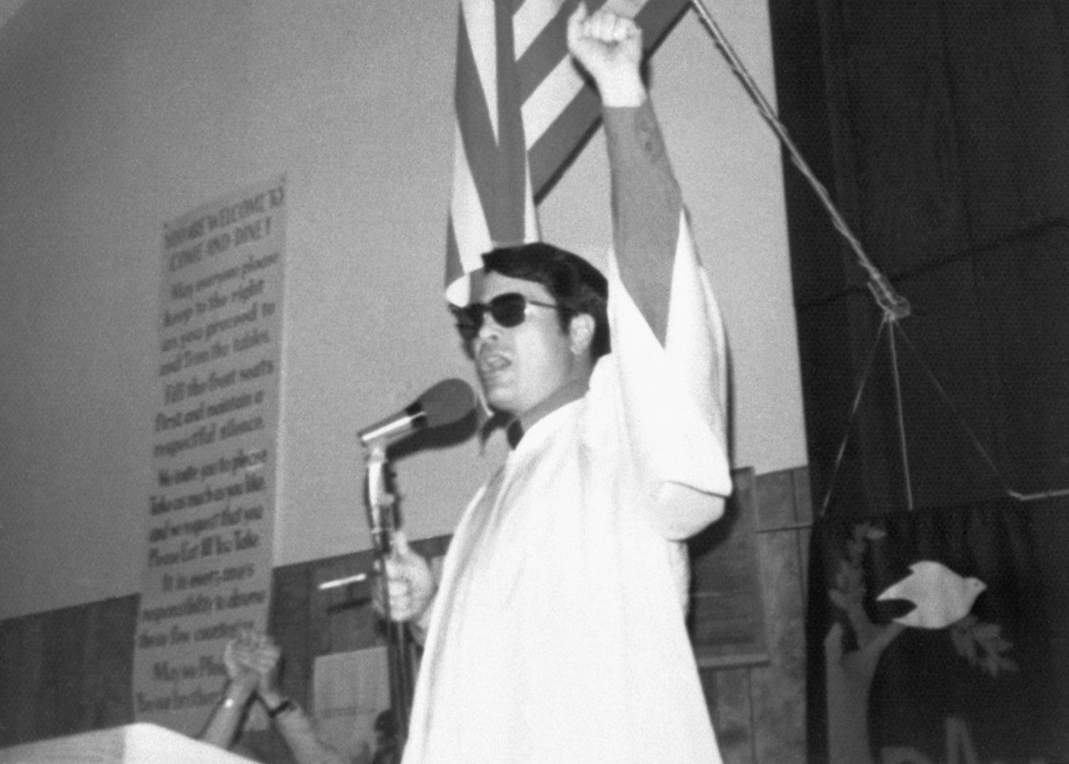 Reverend Jim Jones Raising His Fist