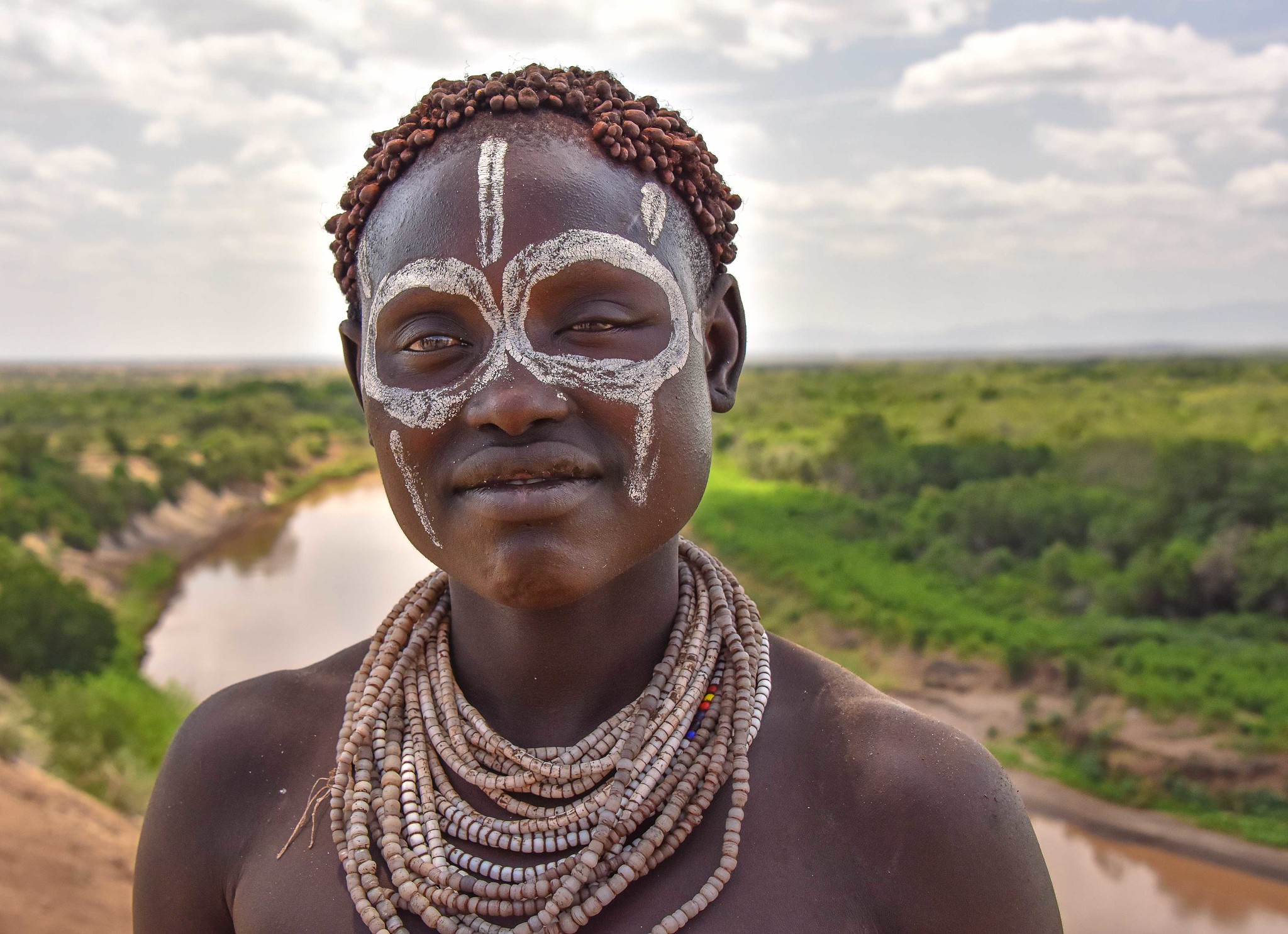 Karo Woman in beads