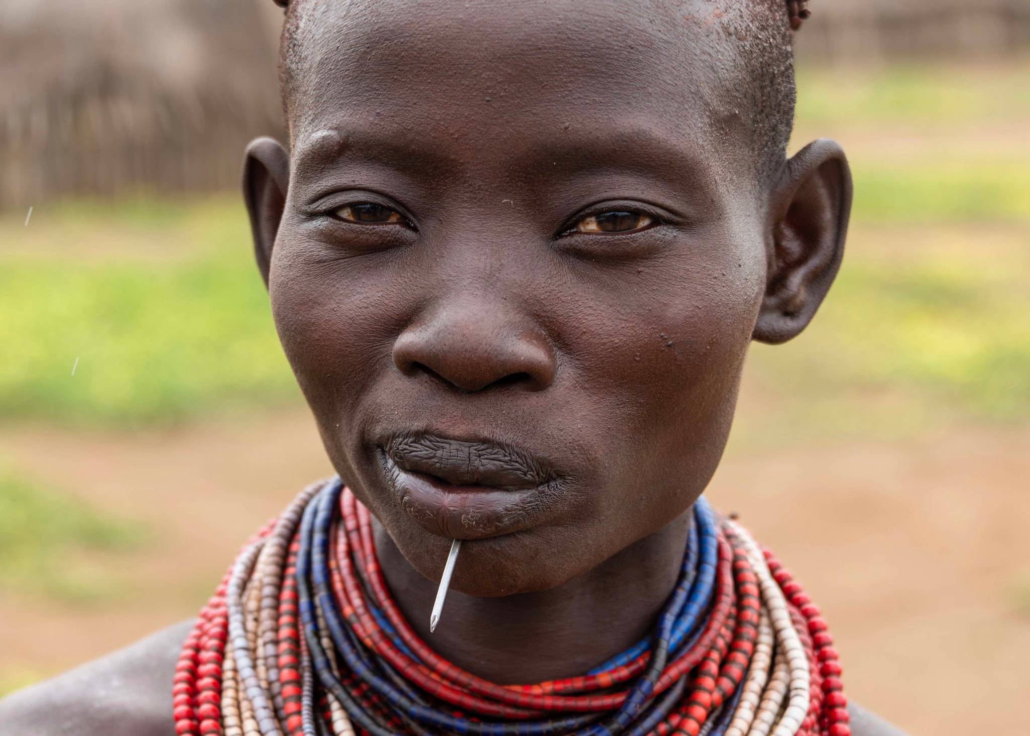 Kwego Woman wearing beads