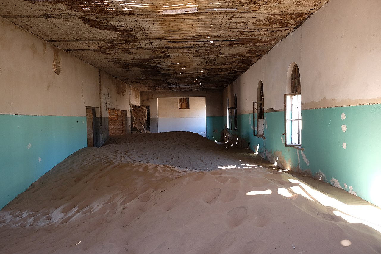 Abandoned small town Kolmanskop – now a tourist destination – outside Lüderitz in Namibia. - 2018