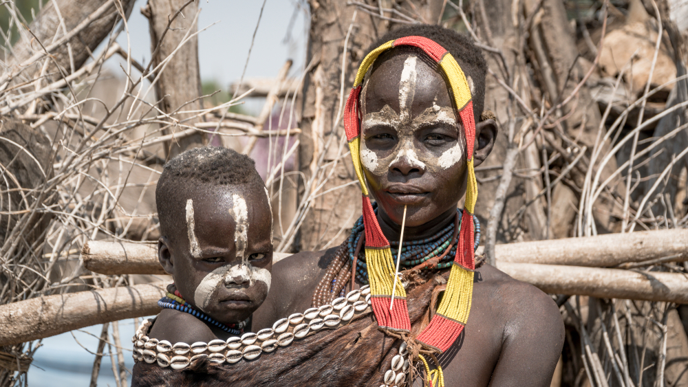 Karo tribe woman with her child