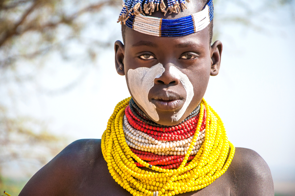 Karo tribe young woman with beautiful colorful necklace