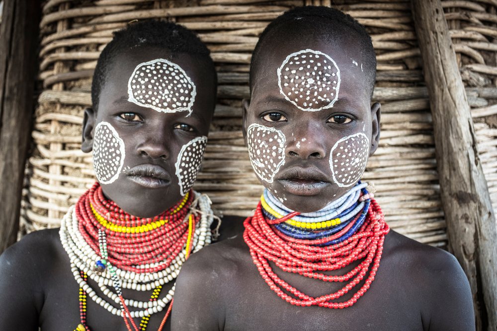 two boys from the Karo tribe in face paint