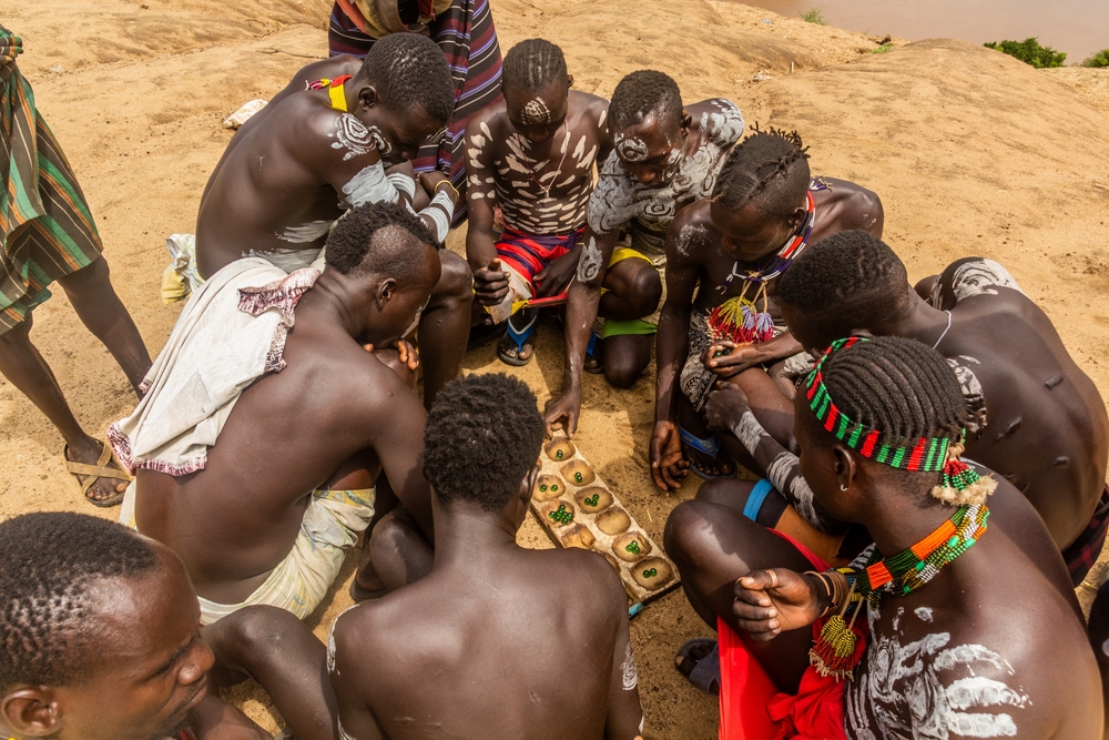 Men of Karo tribe playing a game
