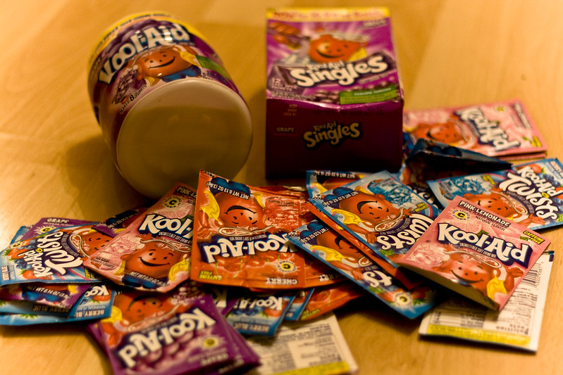 Close-up Photo of Kool-Aid drink placed on a wooden table.