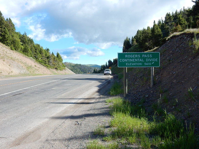 Summit of Rogers Pass, Montana, cloudy sky in background