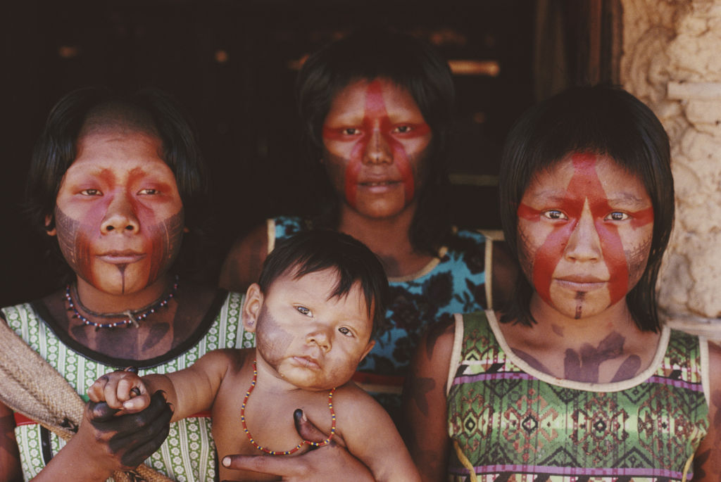 Kayapo women with a baby