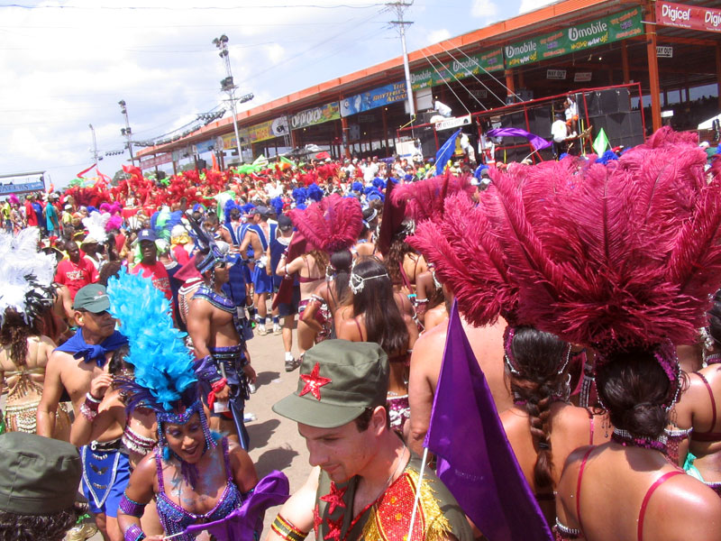 Carnival Masqueraders cross the stage at the Queen's Park Savannah