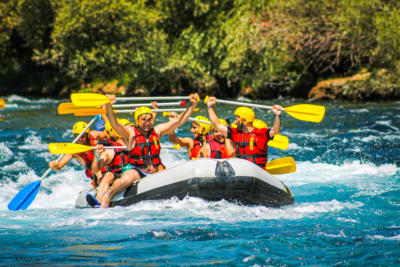 People riding on inflatable raft.