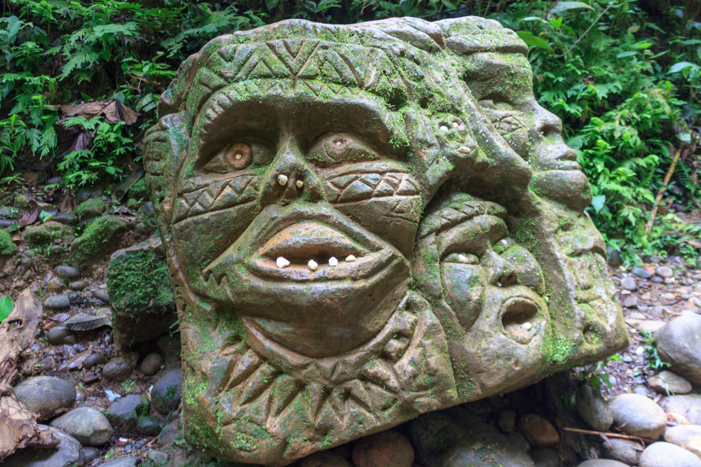 Indigenous statue in the amazon rainforest