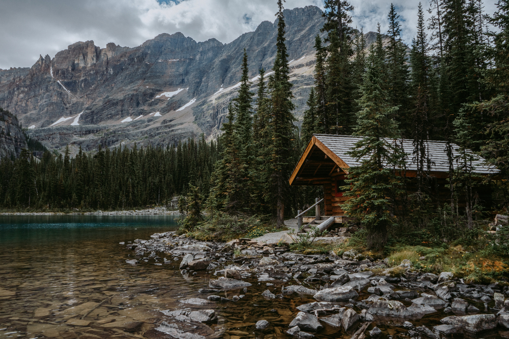 Cozy wooden cabin on shore of Lake Ohara in Yoho National Park, Canadian Rockies.