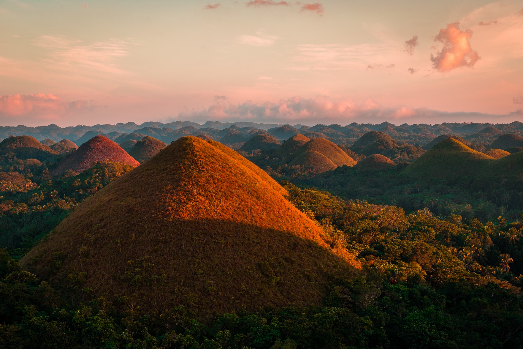 Chocolate hills during sunset in Bohol Island in the Philippines.