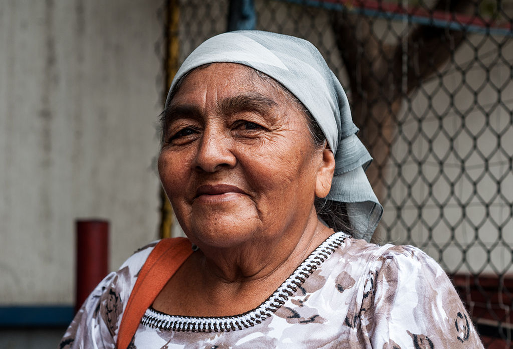 Wayuu Women in the Market, wearing traditional floral dress
