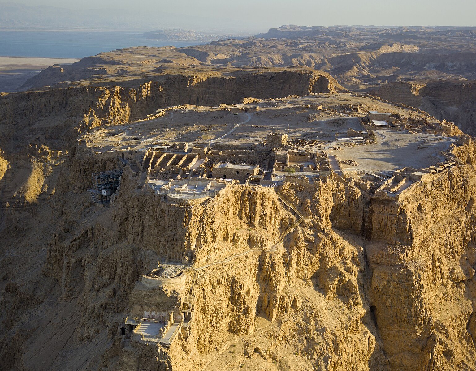 Masada an ancient fortification in southern Israel, situated on top of an isolated rock plateau, akin to a mesa.