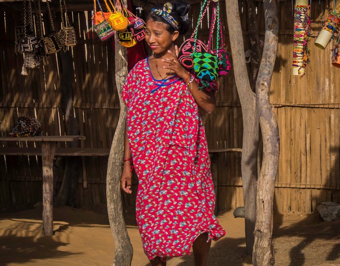 Lady of the indigenous Wayuu tribe living in Cabo de la Vela Colombia selling handicrafts