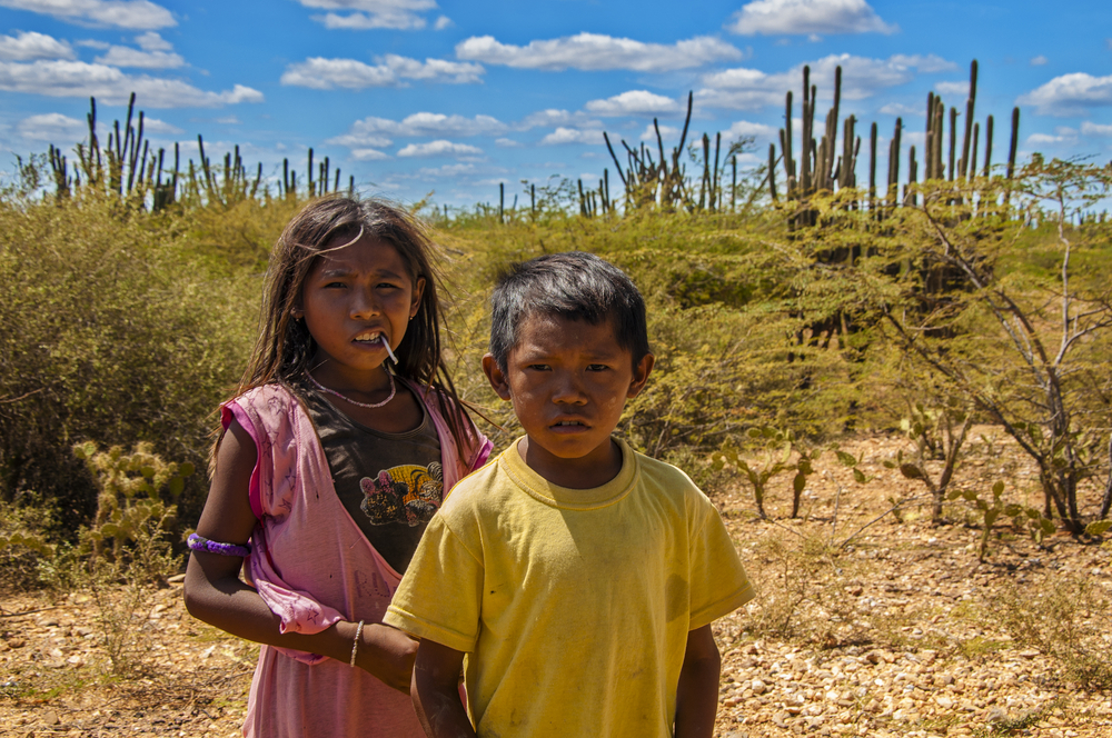 Two Wayuu Indian children in the desert in La Guajira