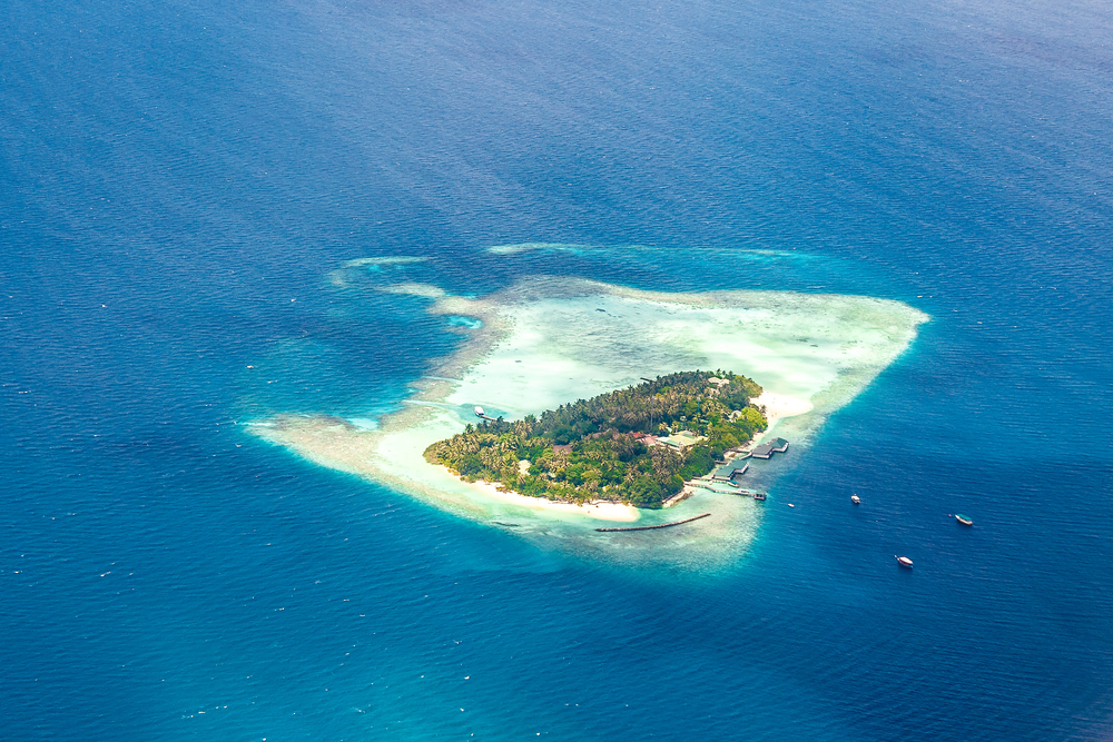 Maldives atoll resort view from airplane