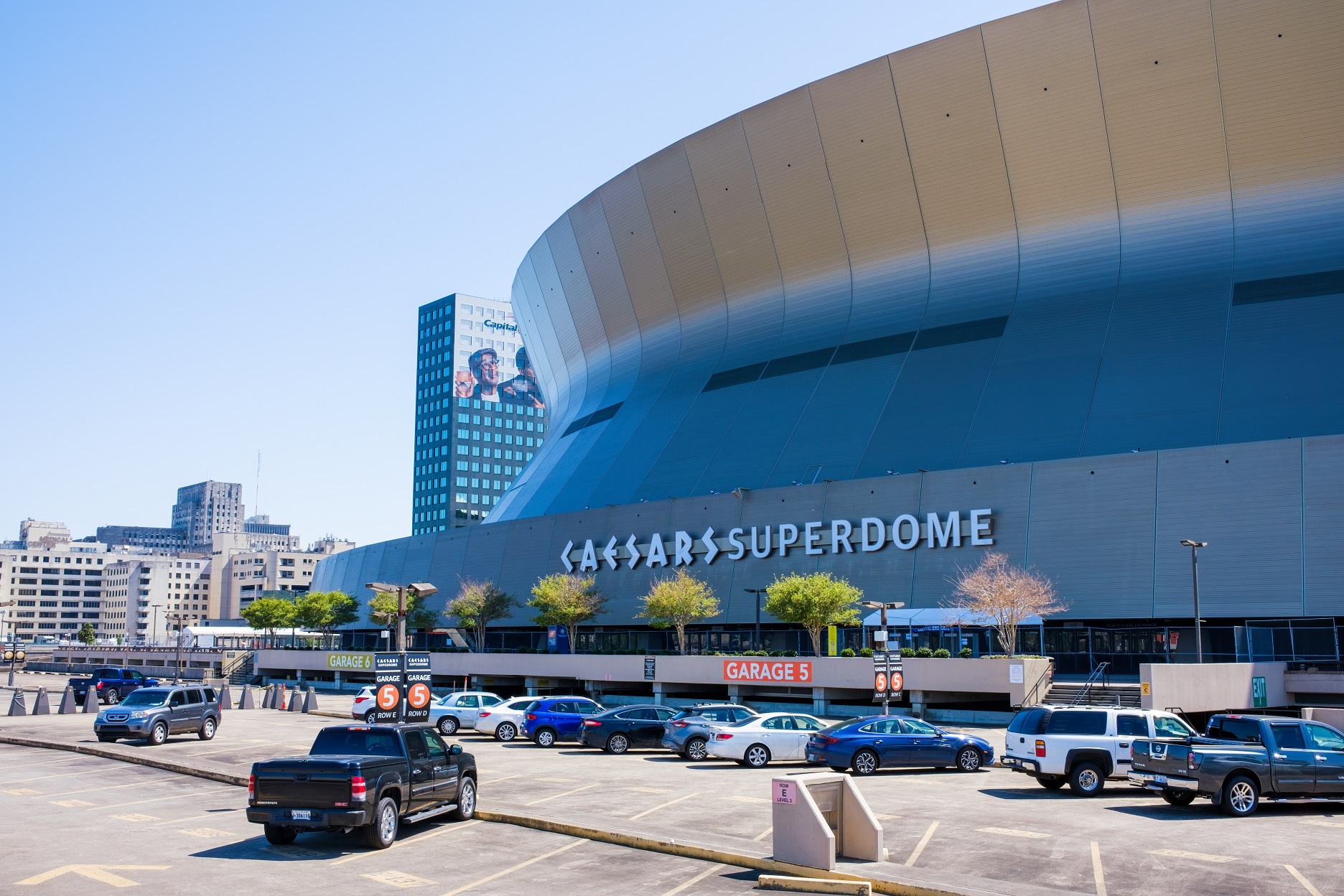 Superdome with parking lot and hint of the skyline during NCAA Men's Final Four Basketball Tournament - 2022