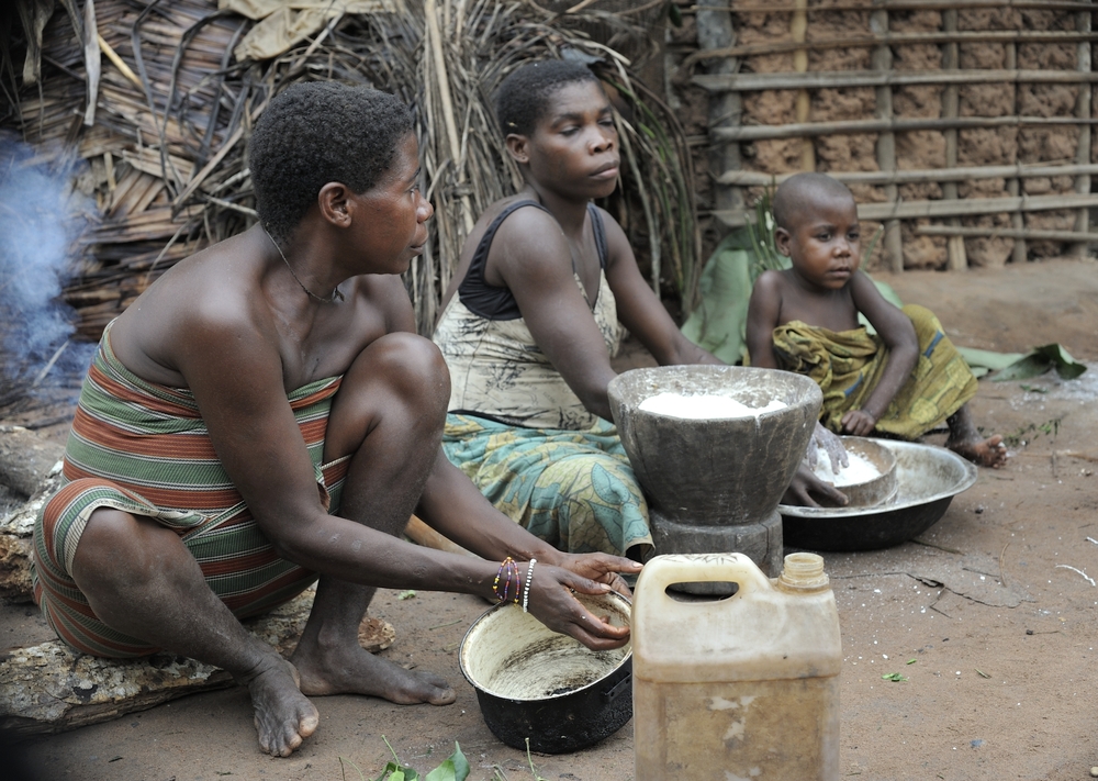 Baka woman cooking  food