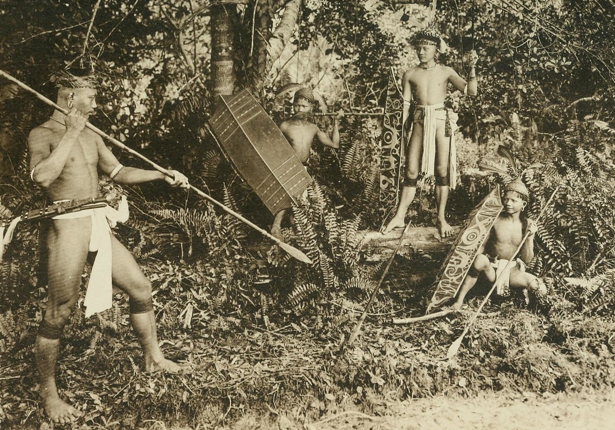 INSTRUCTING KAYAN YOUTHS IN THE JUNGLE - 1912