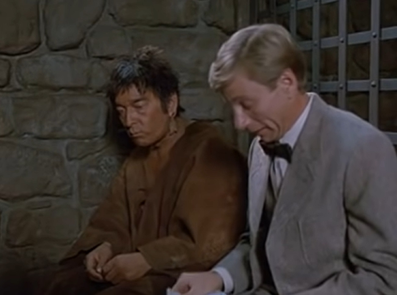 Screenshot of Ishi talking with other man - from The Last of His Tribe (1992)
