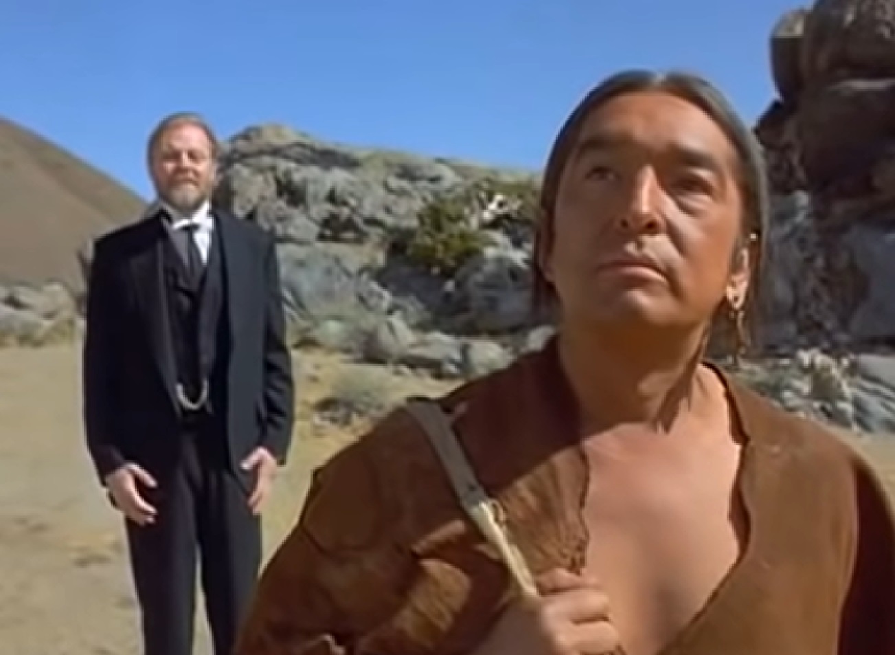 Screenshot of Ishi walking out in nature - from The Last of His Tribe (1992)