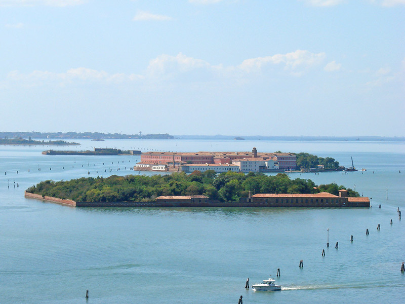 Aerial view of the plagued ghost island of Poveglia in the Venetian lagoon Venice, Italy