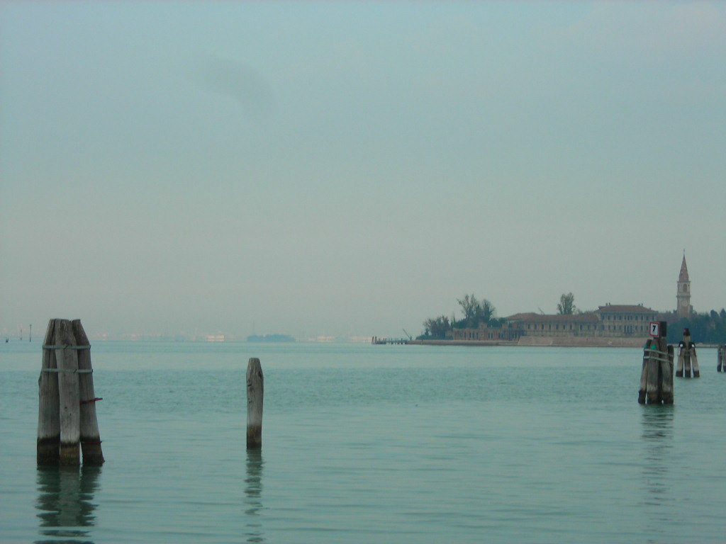 Landscape view of the plagued ghost island of Poveglia in the Venetian lagoon Venice, Italy