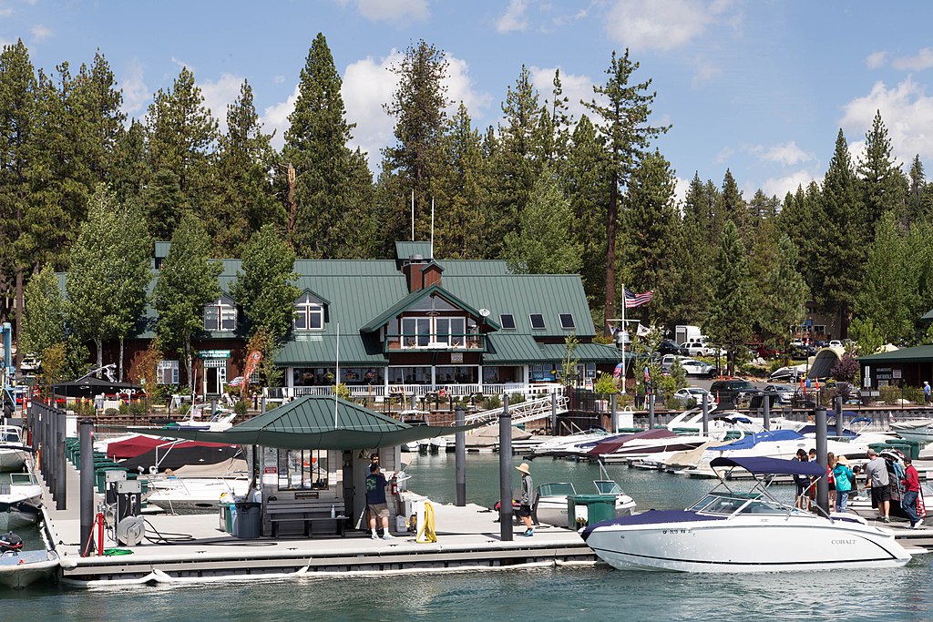 Landscape view of the Tahoe City waterfront with cloudy sky in background.