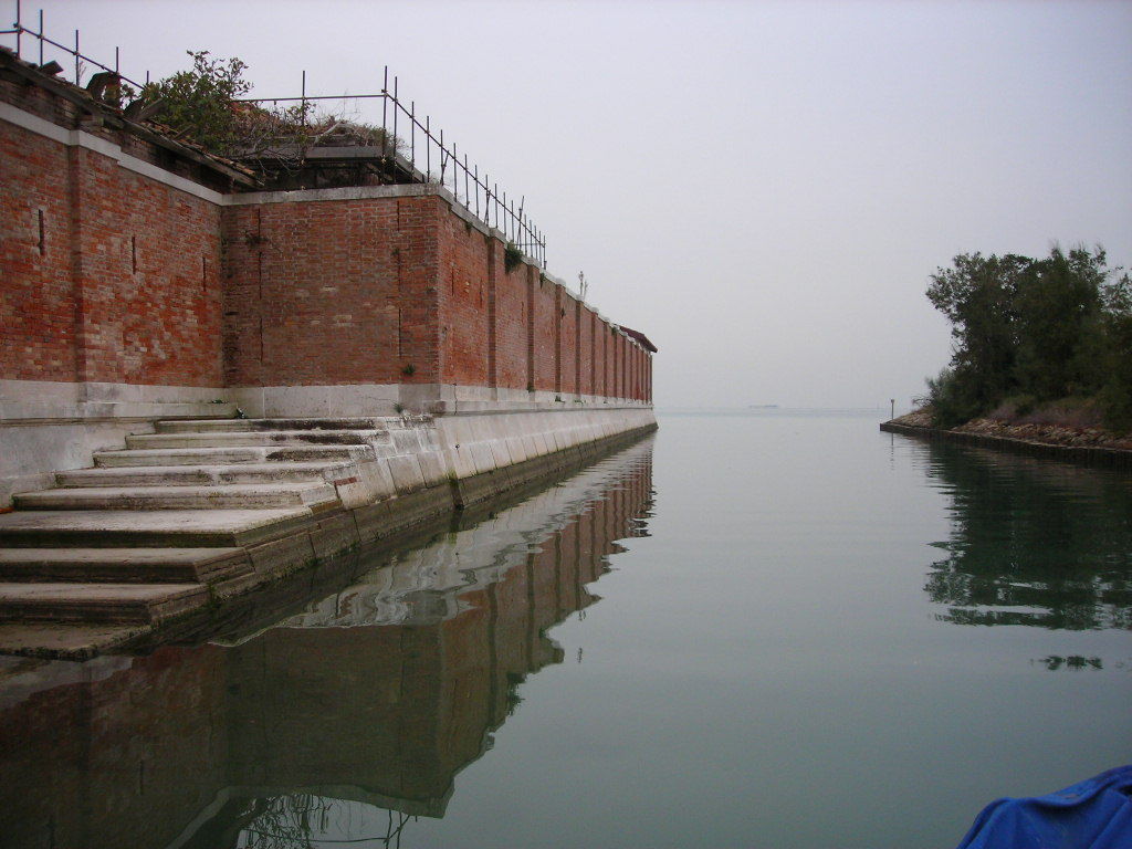 Landscape view of the plagued ghost island of Poveglia in the Venetian lagoon Venice, Italy