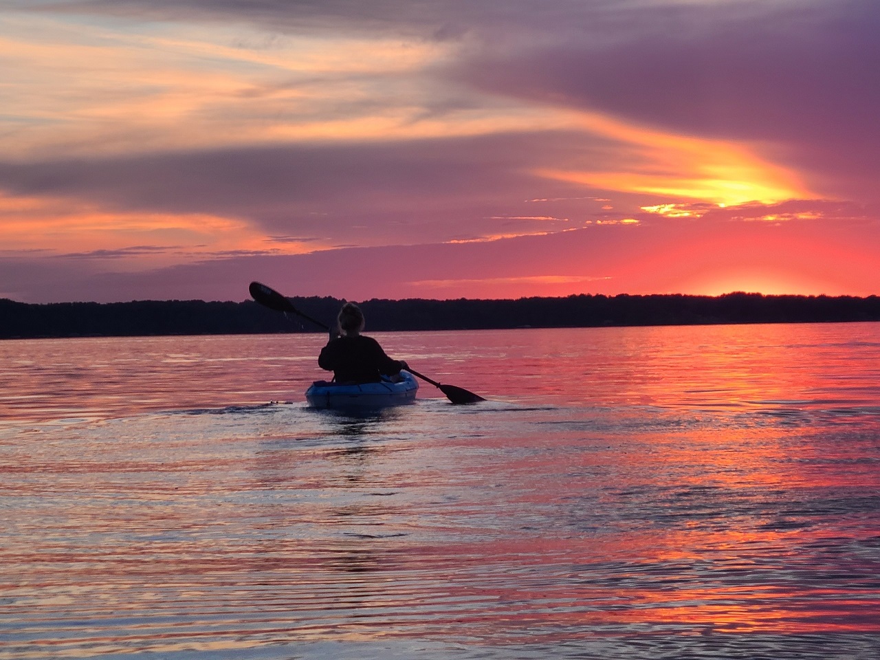 Kayaking the sunset Torch Lake MI