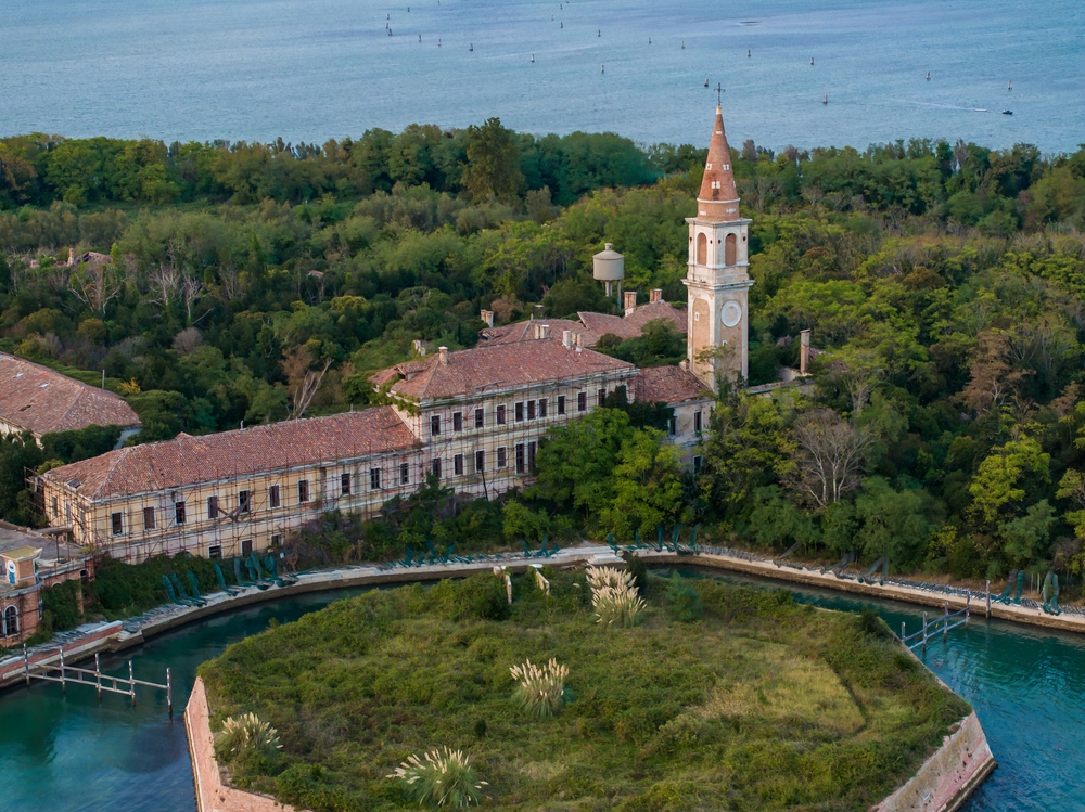 Aerial view of the plagued ghost island of Poveglia in the Venetian lagoon Venice, Italy