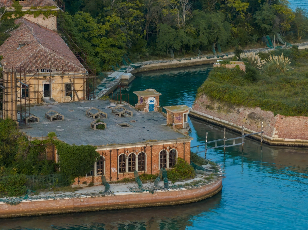 Aerial view of the plagued ghost island of Poveglia in the Venetian lagoon Venice, Italy