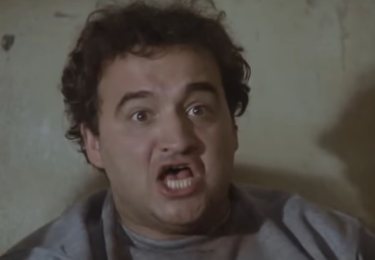 Screenshot of Carrie-Anne Moss looking upset - from The Matrix (1999)